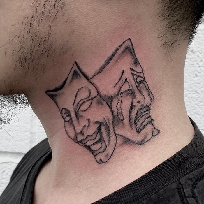 happy sad face mask tattoo