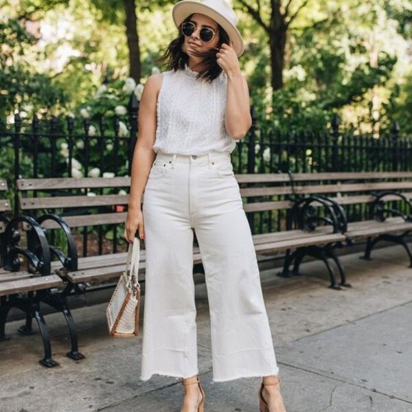 HighImpact Karlie Kloss White Trousers and Sneakers Look for Less   Fashion travel outfit Fashion Winter fashion outfits