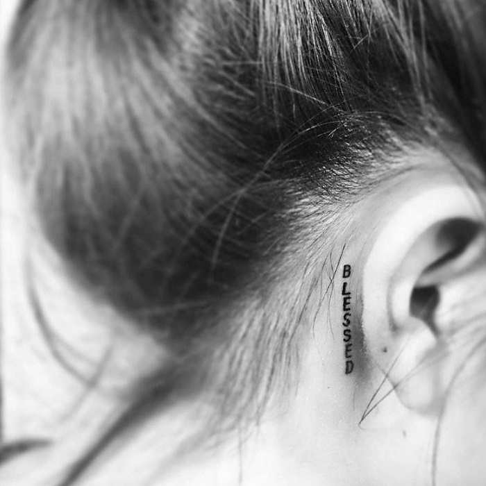 Share more than 58 blessed tattoo behind the ear in.cdgdbentre