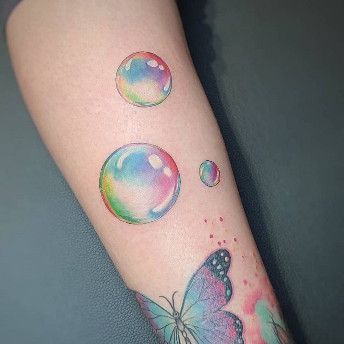 Tattoo fan shows off whopping ink bubble wobbling on her arm after latest  body art  and says its totally normal  The Sun