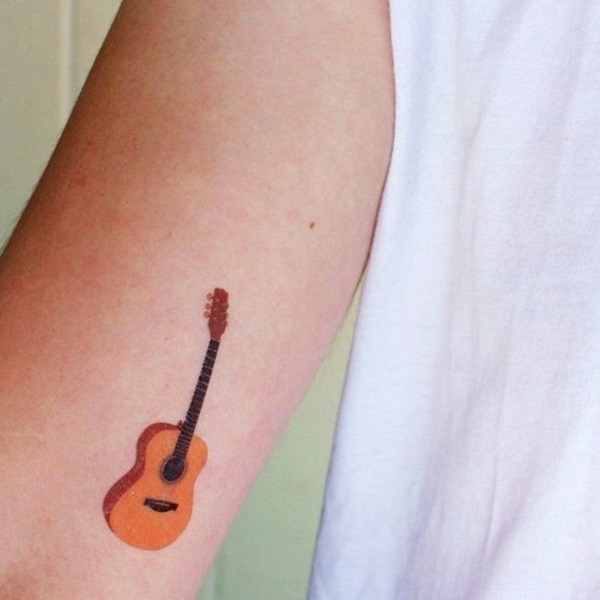 music note on fire tattoo