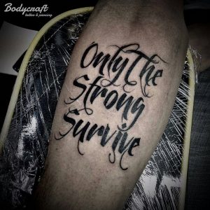 30 Best Only The Strong Survive Tattoo Ideas - Read This First