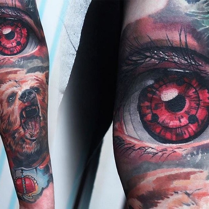 sharingan arm tattoo