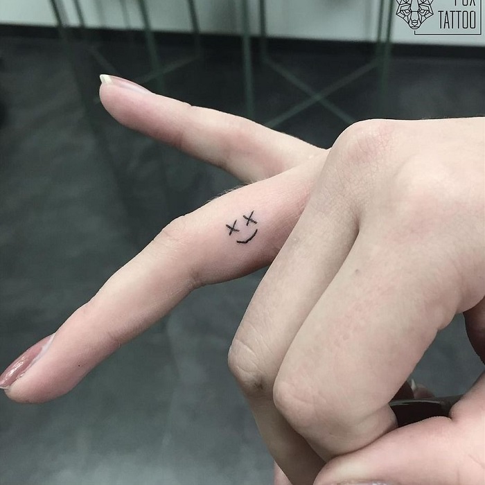 Demi Lovato Gets a Happy Face Tattoo on Her Pinky Finger