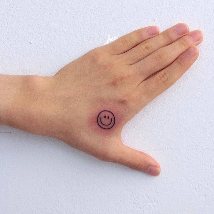 Show Off Your Fun Side With These Smiley Tattoos