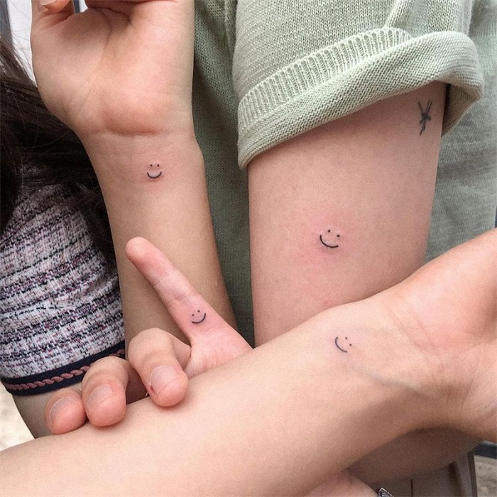 Show Off Your Fun Side With These Smiley Tattoos