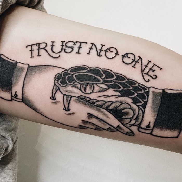 What Does Trust No One Tattoo Mean  Represent Symbolism