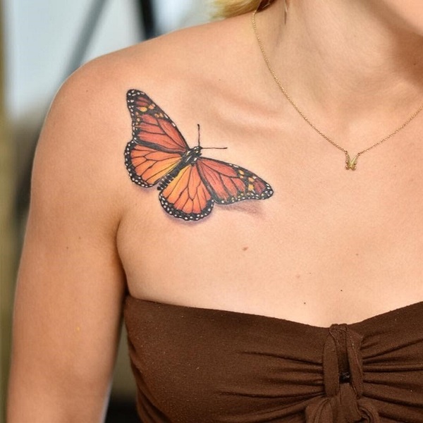 monarch butterfly on flower tattoo