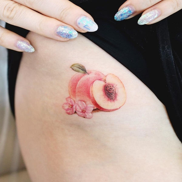 Tattoo uploaded by Tattoodo  Delicate peach tattoo by thistlelike  thistlelike peachtattoos watercolor peach fruit foodtattoo leaves  nature food cute painterly  Tattoodo