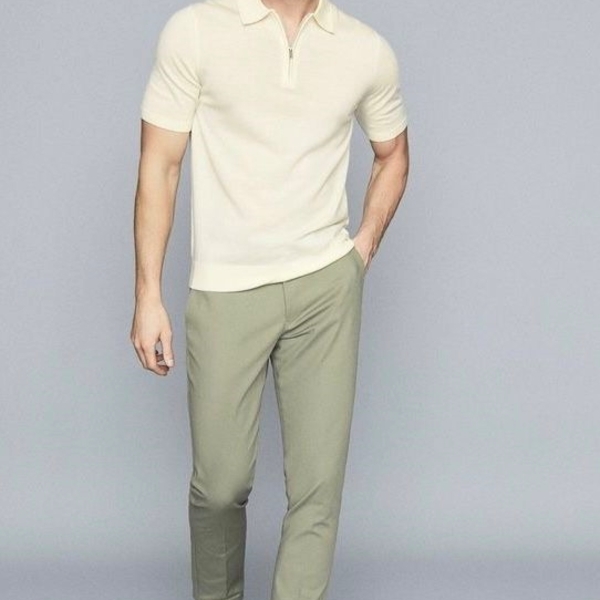 white shirt with olive green pants