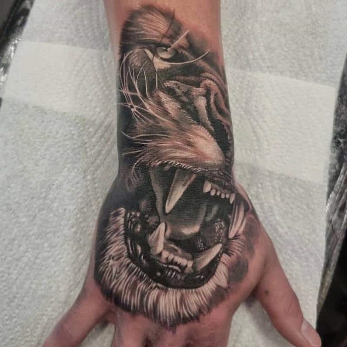 Lion Hand Tattoo Ideas 11