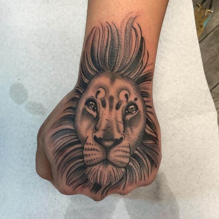 Lion Hand Tattoo Ideas 13