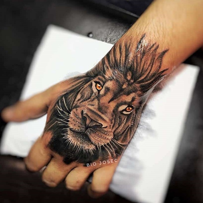 Lion Hand Tattoo Ideas 14