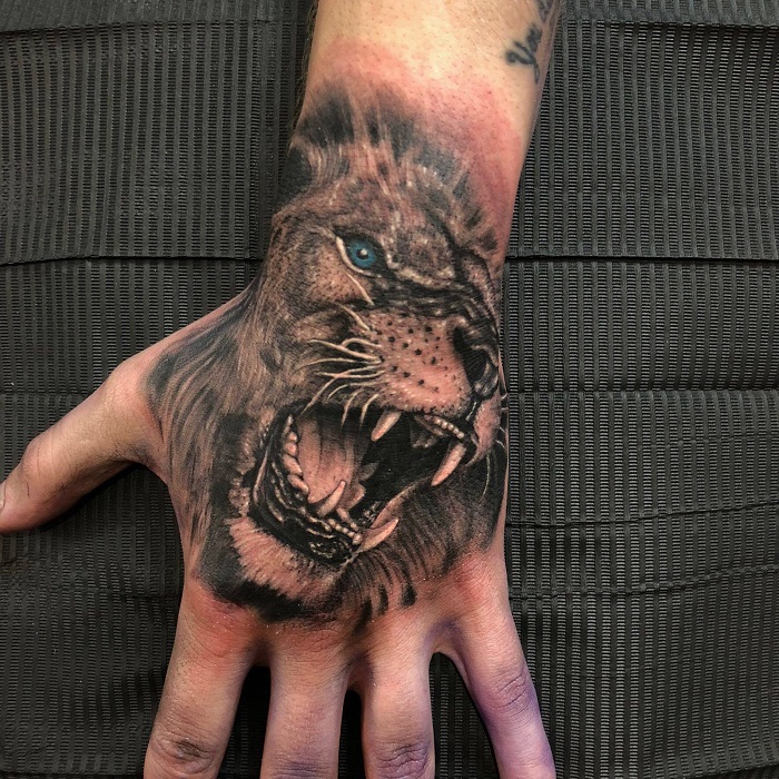 Lion Hand Tattoo Ideas 23