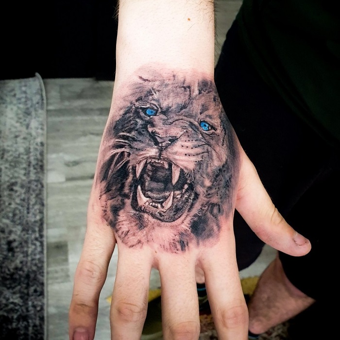 Lion Hand Tattoo Ideas 23