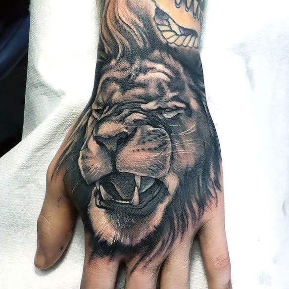 Lion Hand Tattoo Ideas 27