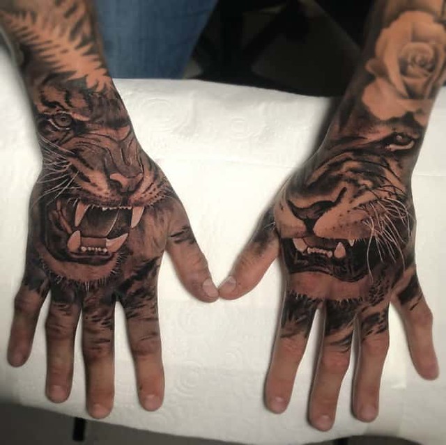 Lion Hand Tattoo Ideas 28