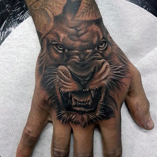Lion Hand Tattoo Ideas 29