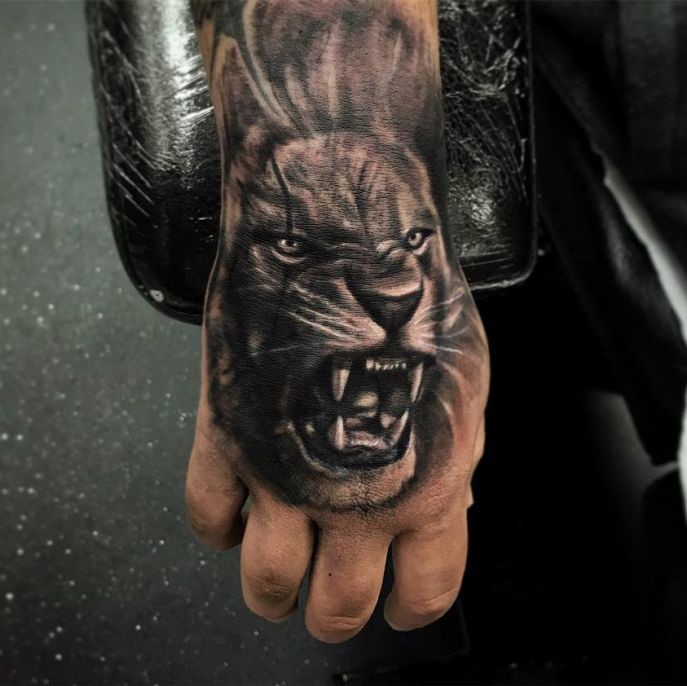 Lion Hand Tattoo Ideas 31