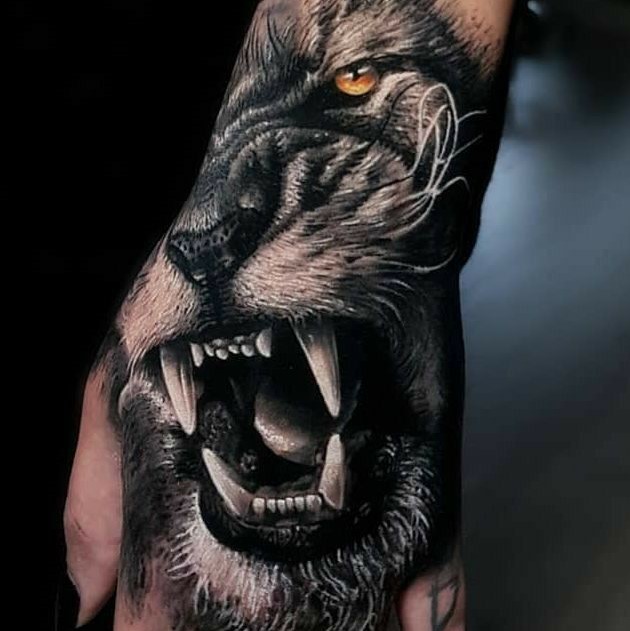 Lion Hand Tattoo Ideas 32