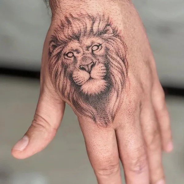 Lion Hand Tattoo Ideas 37