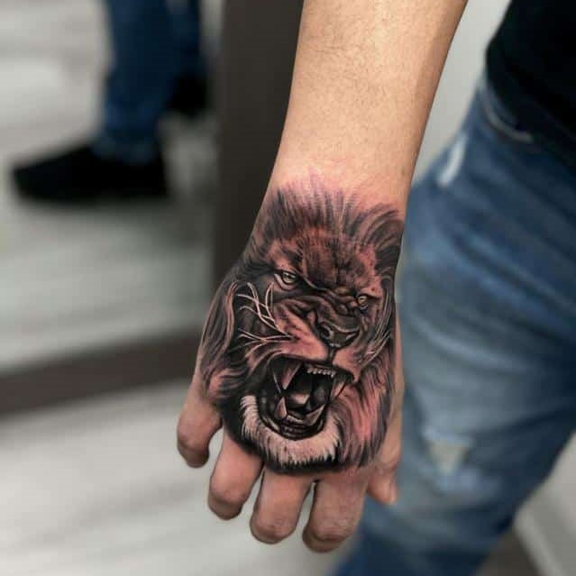 Lion Hand Tattoo Ideas 8