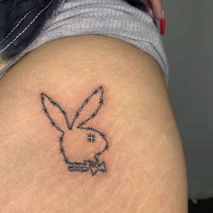 Luis Vuitton playboy bunny tattoo with initials H.C.M. 🐰