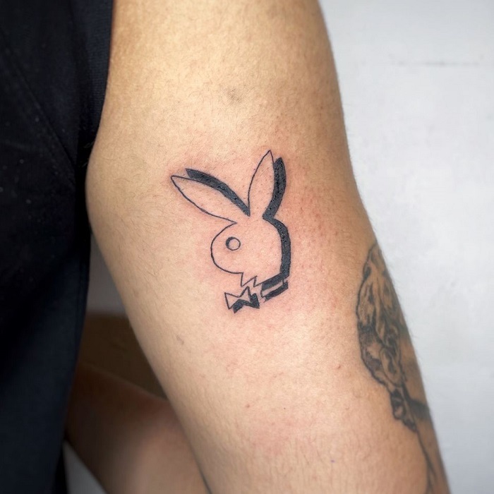 Luis Vuitton playboy bunny tattoo with initials H.C.M. 🐰
