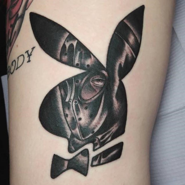 Luis Vuitton playboy bunny tattoo with initials H.C.M. 🐰