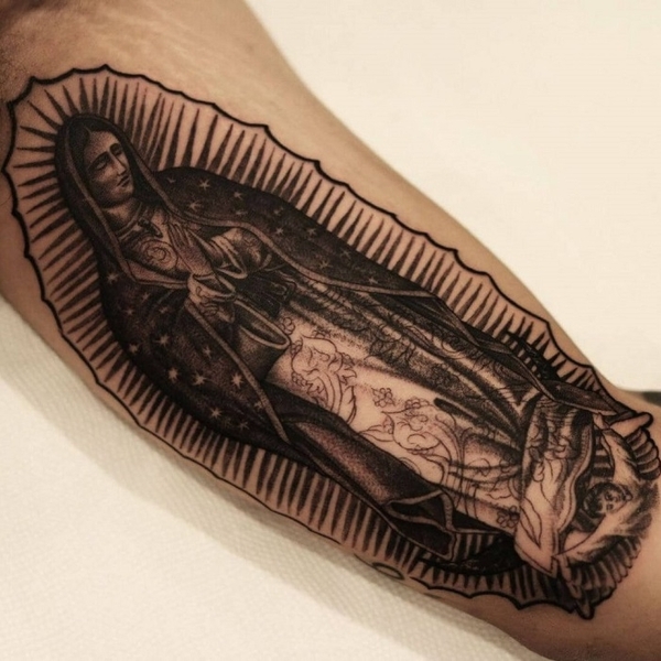 virgin mary forearm tattoo