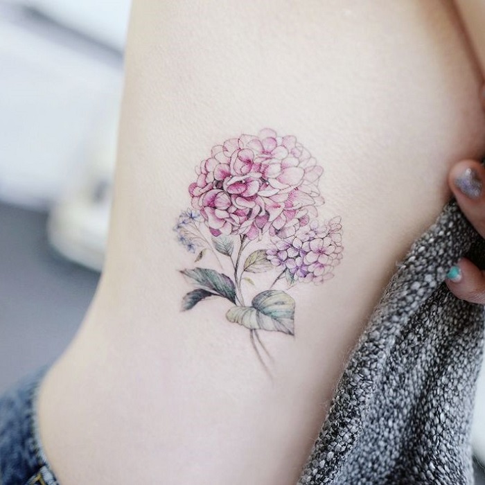 Small hydrangea tattoo on the left thigh  Tattoogridnet