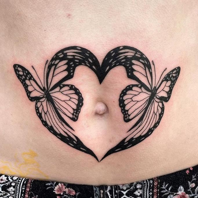 pigeon belly button tattoo