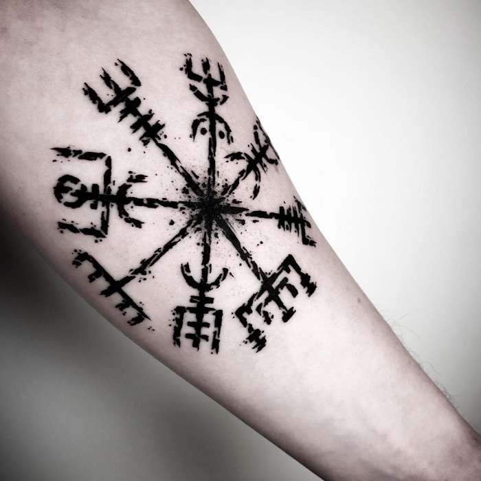 Need help with a tattoo  is there anything Norse about this What did  the runes mean in the circle and under the circle I know the compass  isnt Norse but made